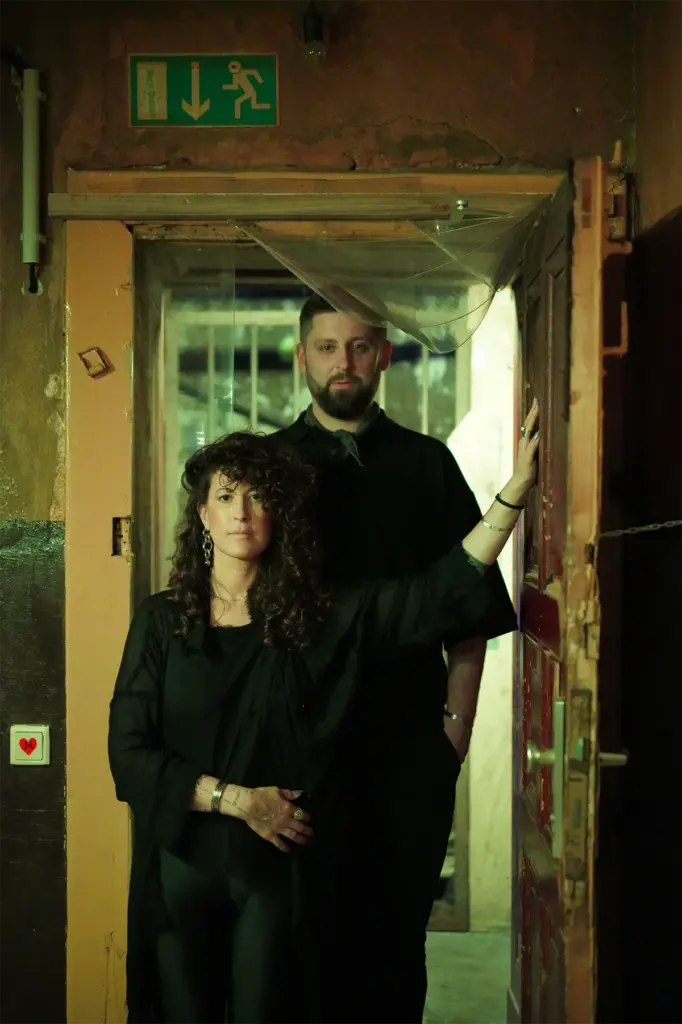 veinyl . berlin - Creators posing in front of an open door.